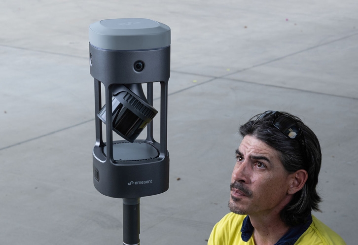 Emesent GX1 RTK SLAM scanner mounted on a pole