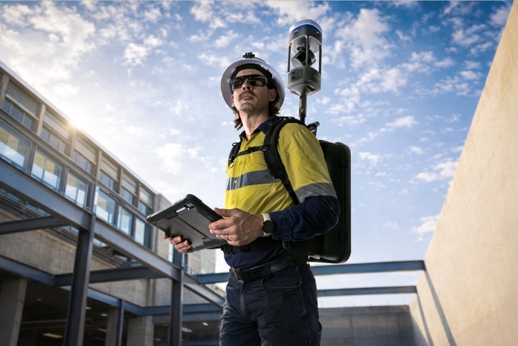 Emesent GX1 mobile mapping scanner capturing building interior for Scan-to-BIM workflow